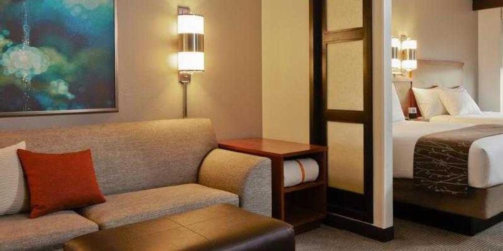 Queen Room with Two Queen Beds and Sofa Bed interior